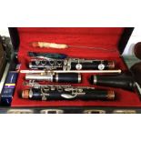 A cased Boosey & Hawkes clarinet. Est. £30 - £50.