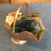 A large copper coal scuttle with hinged top. Est.