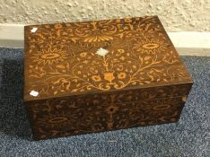 A mahogany and satinwood inlaid caddy. Est. £60 -