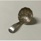 A heavy silver caddy scoop with fluted bowl. Sheff
