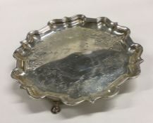 A good Georgian silver salver with engraved decora