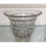 A large swag decorated bowl with crimped rim. Est.