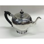 A heavy Russian silver bullet shaped teapot of pla