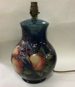 MOORCROFT: A 'Blue Finches' pattern table lamp dec