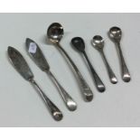 A collection of OE pattern silver butter knives an