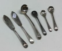 A collection of OE pattern silver butter knives an