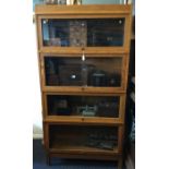 A large four stack Globe Wernicke bookcase. Est. £