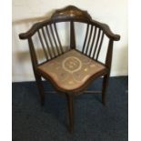 A good inlaid corner chair with upholstered seat.