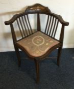 A good inlaid corner chair with upholstered seat.