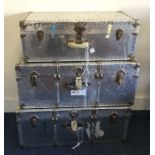 A group of three old travelling trunks. Est. £30 -