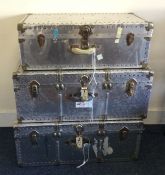 A group of three old travelling trunks. Est. £30 -