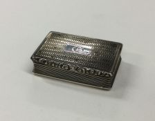 A large engine turned silver snuff box with reeded