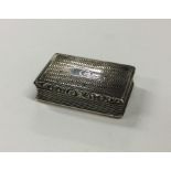 A large engine turned silver snuff box with reeded