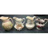 A group of four decorative jugs. Est. £20 - £30.