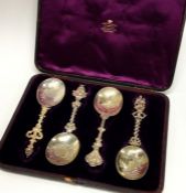 EDINBURGH: A good set of four cast silver gilt spo