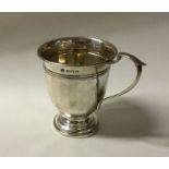An Edwardian silver panelled christening cup. Shef