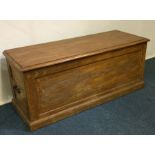 A hinged top pine trunk. Est. £30 - £50.