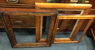 Two maple frames together with a rosewood frame. E