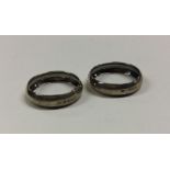 A pair of plain circular silver napkin rings. Birm