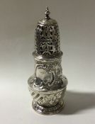 A heavy George II silver sugar caster. London 1756