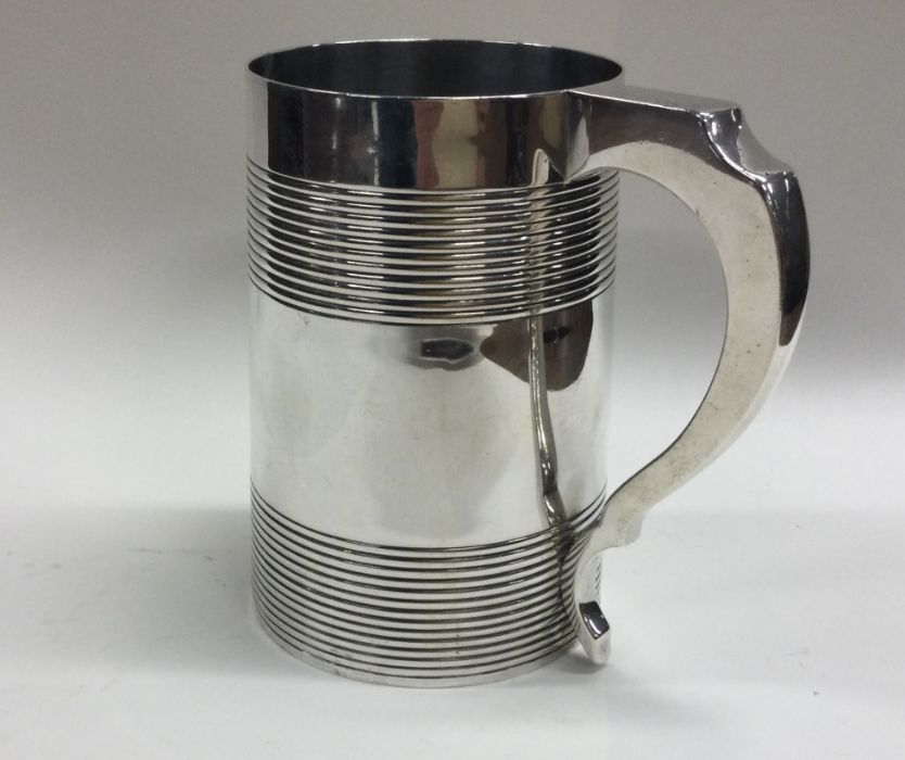 A heavy Georgian silver quart tankard with taperin - Image 2 of 4