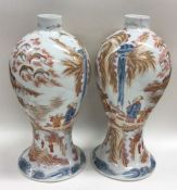 A large pair of decorative Chinese vases painted i