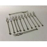 A good set of twelve Continental silver forks with