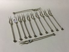 A good set of twelve Continental silver forks with
