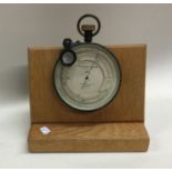 A brass mounted surveying barometer by E R Watts o