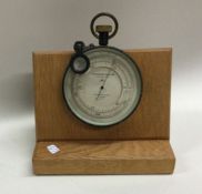 A brass mounted surveying barometer by E R Watts o