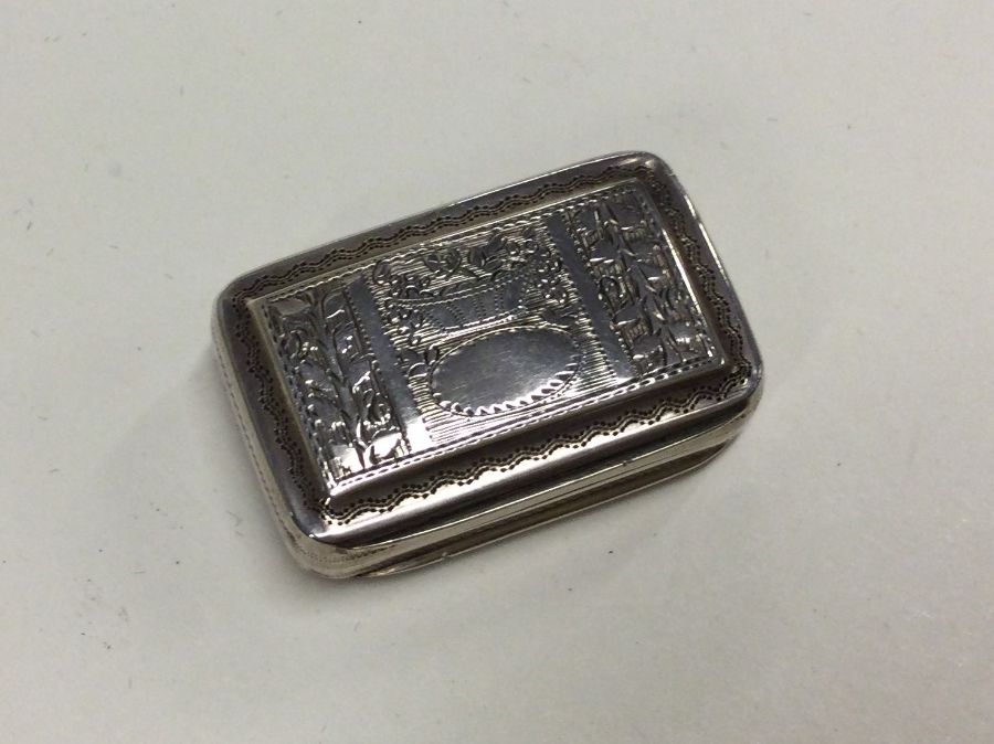 A good Georgian silver hinged top engraved vinaigr - Image 4 of 6