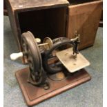 An unusual boxed manual sewing machine. Est. £30 -