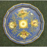 A good decorative blue plate with gilded borders.