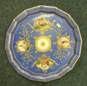 A good decorative blue plate with gilded borders.