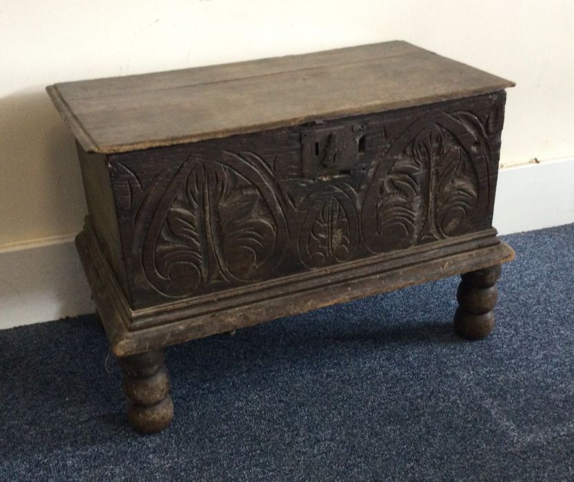 AN oak carved bible box on four turned supports. E - Image 3 of 6