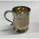 A good Georgian style silver mug on pedestal foot.