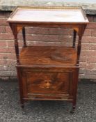 A Victorian rosewood inlaid music cabinet with hin