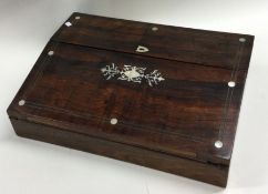 A rosewood and MOP slope top stationery box. Est.