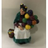 A Royal Doulton figure entitled, 'The Balloon Sell