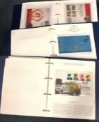 Three folios of first day stamp and coin covers. E