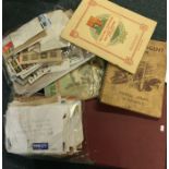 A box containing stamps and stamp albums. Est. £30