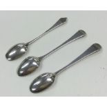 A rare set of three miniature spoons; one with dog