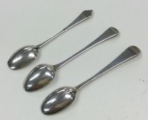 A rare set of three miniature spoons; one with dog