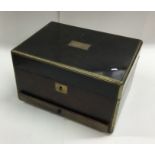 A calamander wood and brass mounted box with flush