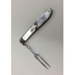 An Edwardian silver and MOP fruit knife with etche