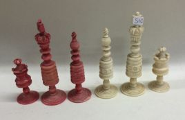 A group of carved ivory chess pieces. Est. £30 - £