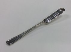 An Edwardian silver marrow scoop. Birmingham 1909.