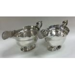 A good pair of George II style silver sauce boats