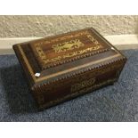 A good rosewood and brass inlaid tea caddy. Est. £