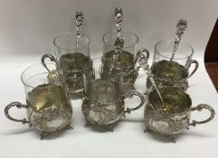 A good set of Continental silver cups with clear g